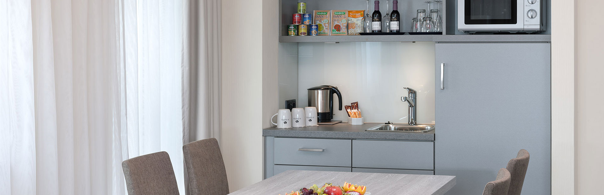 Image of the Superior room with kitchenette at the SI-SUITES Hotel Stuttgart