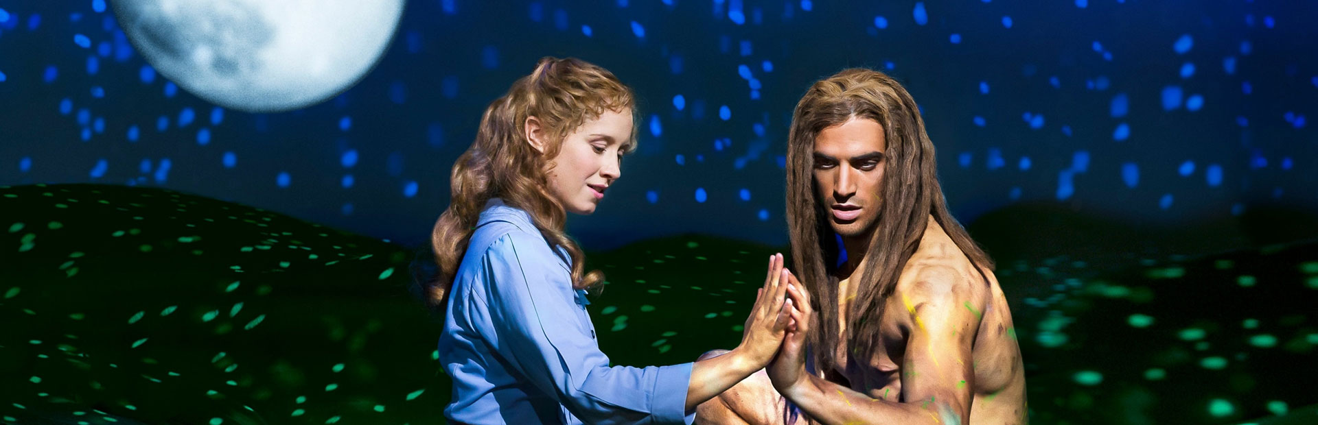Tarzan and Jane in a touching moment on stage
